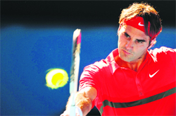 Roger Federer hits a return during his match against Juan Martin del Potro in Melbourne on Tuesday. 