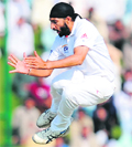 England�s Monty Panesar jumps in the air to celebrate the wicket of Misbah-ul-Haq in Abu Dhabi 