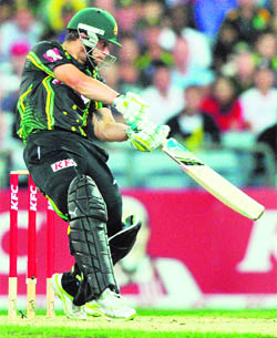 Matthew Wade of Australia hits out against India during their Twenty20 match in Sydney on Wednesday. 