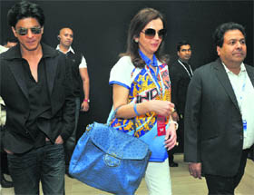 Owner of Mumbai Indians Neeta Ambani (C), Bollywood actor and owner of Kolkata Knight Riders Shah Rukh Khan (L), and IPL Chairman Rajiv Shukla (R) arrive for a post-players' auction press conference for the fifth edition of the Indian Premier League in Bangalore on Saturday. 