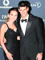 Serbian tennis player Novak Djokovic arrives with his girlfriend Jelena Ristic for the Laureus World Sports Awards in London