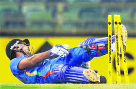 Virat Kohli crashes in the stumps after being run out in the ODI against Sri Lanka at the WACA in Perth on Wednesday. Kohli scored 77 as India went on to win by four wickets