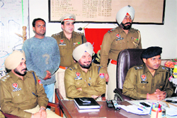 The rescued rice miller (standing behind) after his release