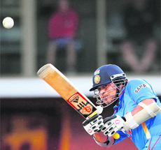 Sachin Tendulkar plays a shot during the tri-series match against Sri Lanka at the Bellerive Oval in Hobart on Sunday. 