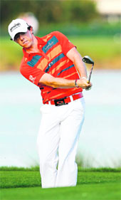 Rory McIlroy chips on to the 12th green during the third round of the Honda Classic at the PGA National in Palm Beach Gardens, Florida on Sunday