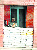 A guard outside a strongroom in Jalandhar. 