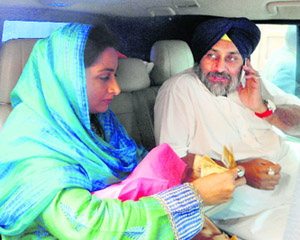 SAD chief Sukhbir Singh Badal with his wife and MP Harsimrat Kaur Badal at Badal village on Wendesday.