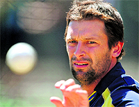 Australia�s Ben Hilfenhaus catches the ball during a practice session in Adelaide on Wednesday. Australia and Sri Lanka play the decisive final on Thursday