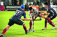 Players of Sher-E-Punjab and Delhi Wizards vie for the ball during their match in Jalandhar on Wednesday. Delhi Wizards won 2-1