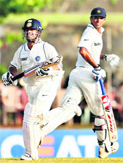 Rahul Dravid (R) is the second highest Test run scorer, trailing only Sachin Tendulkar (L). 