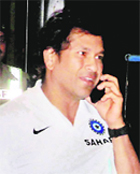 Sachin Tendulkar arrives at the Mumbai airport as the Indian team departed for Dhaka for the Asia Cup on Saturday