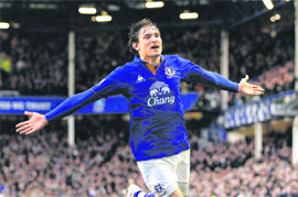 Everton's Nikica Jelavic celebrates after scoring against Tottenham Hotspur in Liverpool on Saturday. Everton won 1-0. 
