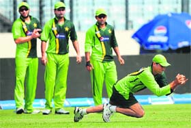 Pakistan's Younis Khan takes a catch during a training session at the Sher-e-Bangla Stadium in Dhaka on on the eve of their match against Sri Lanka on Wednesday