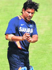 Sachin Tendulkar prepares before going in to bat during a training session in Dhaka on Thursday