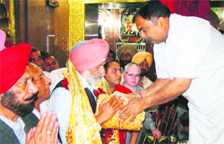 Punjab Rural Development and Panchayat Minister Surjit Singh Rakhra at the historic Mata Kali temple in Patiala