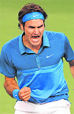 Roger Federer celebrates during his 6-4, 6-3 win over Rafael Nadal at the Indian Wells Tennis Garden in California on Saturday