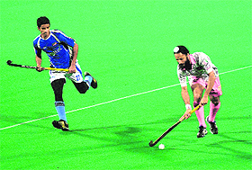 Delhi Wizards� Rajpal Singh in action against Chandigarh Comets in Chandigarh on Tuesday. Comets won the match 3-2 .