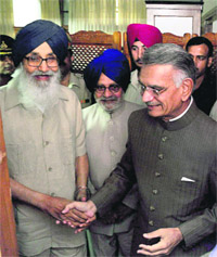 Chief Minister Parkash Singh Badal and Assembly Speaker Charanjit Singh Atwal (centre) welcome Governor Shivraj Patil at the Vidhan Sabha. 