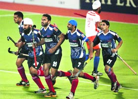 Sher-e-Punjab players celebrate a goal against Mumbai Marines in Jalandhar on Wednesday. Sher-e-Punjab won the match 2-1