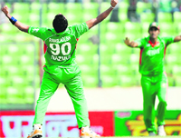Bangladesh�s Nazmul Hossain (L) reacts after the dismissal of Pakistan�s Younis Khan during the Asia Cup final at the Sher-e-Bangla Stadium in Dhaka on Thursday. Pakistan won the match and the trophy by beating Bangladesh by 3 runs