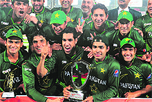 Pakistan players celebrate with the tournament trophy after winning the Asia Cup final against Bangladesh at the Sher-e-Bangla Stadium in Dhaka on Thursday. Pakistan players heaped praise on Bangladesh for excelling during the tournament. 