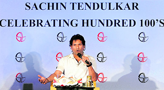 Sachin Tendulkar addresses a press conference during the celebration to mark his 100th century in Mumbai on Sunday