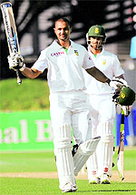 South Africa's Alviro Petersen celebrates after his century against New Zealand on the third day of the third Test in Wellington on Sunday