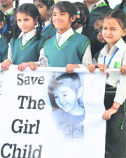 Schoolgirls hold an awareness rally against female foeticide in Patiala on Monday.