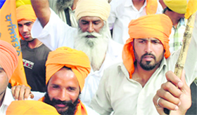 Members of various Sikh bodies during a protest in Patiala on Monday.