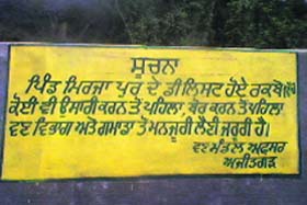 A notice board put up by the Forest Department in Mirzapur forest area