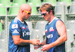 Mumbai Indians� Herschelle Gibbs (L) with fielding coach Jonty Rhodes at a practice session at the Wankhede Stadium in Mumbai on Friday