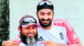 England�s Monty Panesar (right) poses with spin bowling coach Mushtaq Ahmed during a training session ahead of their second Test against Sri Lanka in Colombo.