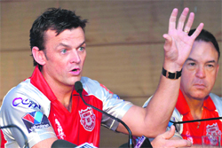 Kings XI Punjab�s captain-cum-coach Adam Gilchrist (L), and fielding coach Mike Young during a press conference at the PCA Stadium in Mohali on Monday.
