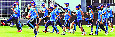 Delhi Daredevils' players warm up during a training session at Eden Garden in Kolkata on Wednesday. Kolkata Knight Riders face Delhi Daredevils in the second match of the Indian Premier League on Friday