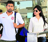 Kings XI Punjab's Praveen Kumar with his wife in Jaipur on Thursday