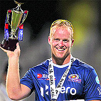 Mumbai Indians' Richard Levi with his Man of the Match trophy after their match against Chennai Super Kings in Chennai on Wednesday