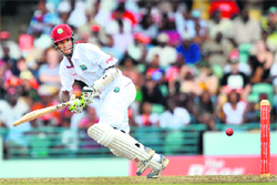 West Indies� Kraigg Brathwaite plays a shot during the first day of the first-of-three Test matches between Australia and the West Indies at the Kensington Oval stadium in Bridgetown on Saturday. 