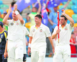 Australia�s Peter Siddle, Mike Hussey and Matthew Wade acknowledge the applause of their fans after defeating the West Indies in their first Test. 