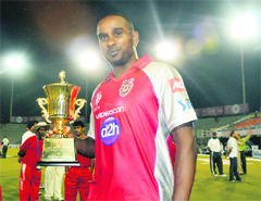 Dimitri Mascarenhas with the man-of-the-match trophy in Mohali on Thursday. 