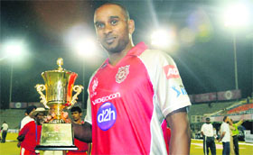 Dimitri Mascarenhas with the man-of-the-match trophy in Mohali on Thursday. 
