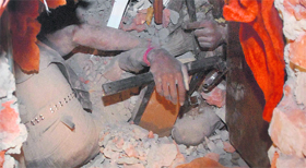 workers buried under the debris.