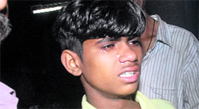A boy mourns his relative�s death.