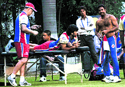 Zaheer Khan (C) during a training session at the PCA Stadium on Thursday