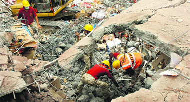 Rescue personnel remove debris in Jalandhar 