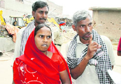 A worried Chandrawati awaiting word on her husband Bhagwan Dass.