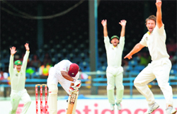 Australia�s Ben Hilfenhaus (right) and teammates appeal during the final day of the second Test against the West Indies at Queen�s Park Oval in Port-of-Spain. 