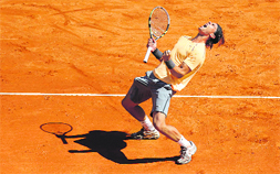 Spain's Rafael Nadal celebrates after winning against Serbia's Novak Djokovic during the Monte-Carlo ATP Masters final in Monaco on Sunday. 