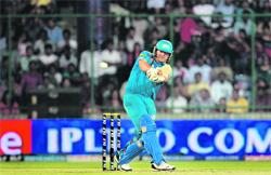 Pune Warriors� Jesse Ryder plays a shot during their match against Delhi Daredevils in New Delhi on Saturday.