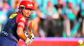Delhi Daredevils captain Virender Sehwag plays a shot during the IPL T20 match between Pune Warriors India and Delhi Daredevils in Pune on Tuesday.