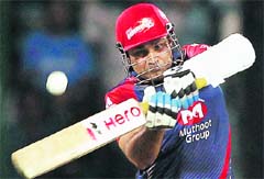 Delhi Daredevils� Virender Sehwag plays a shot against Mumbai Indians during their match in New Delhi. 